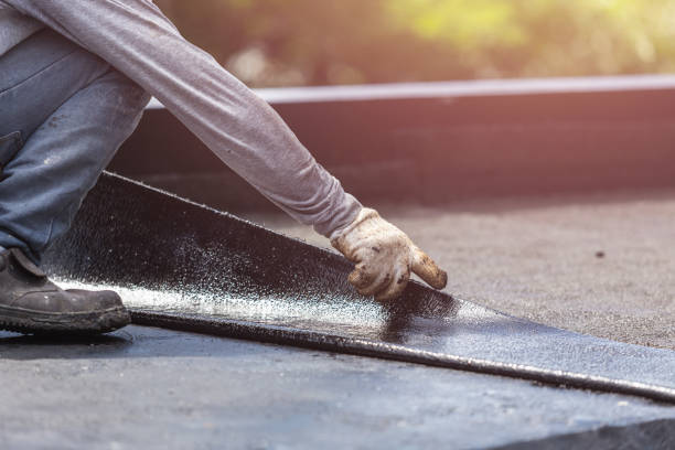 Professional Basement Waterproofing technician working in Barnegat, NJ